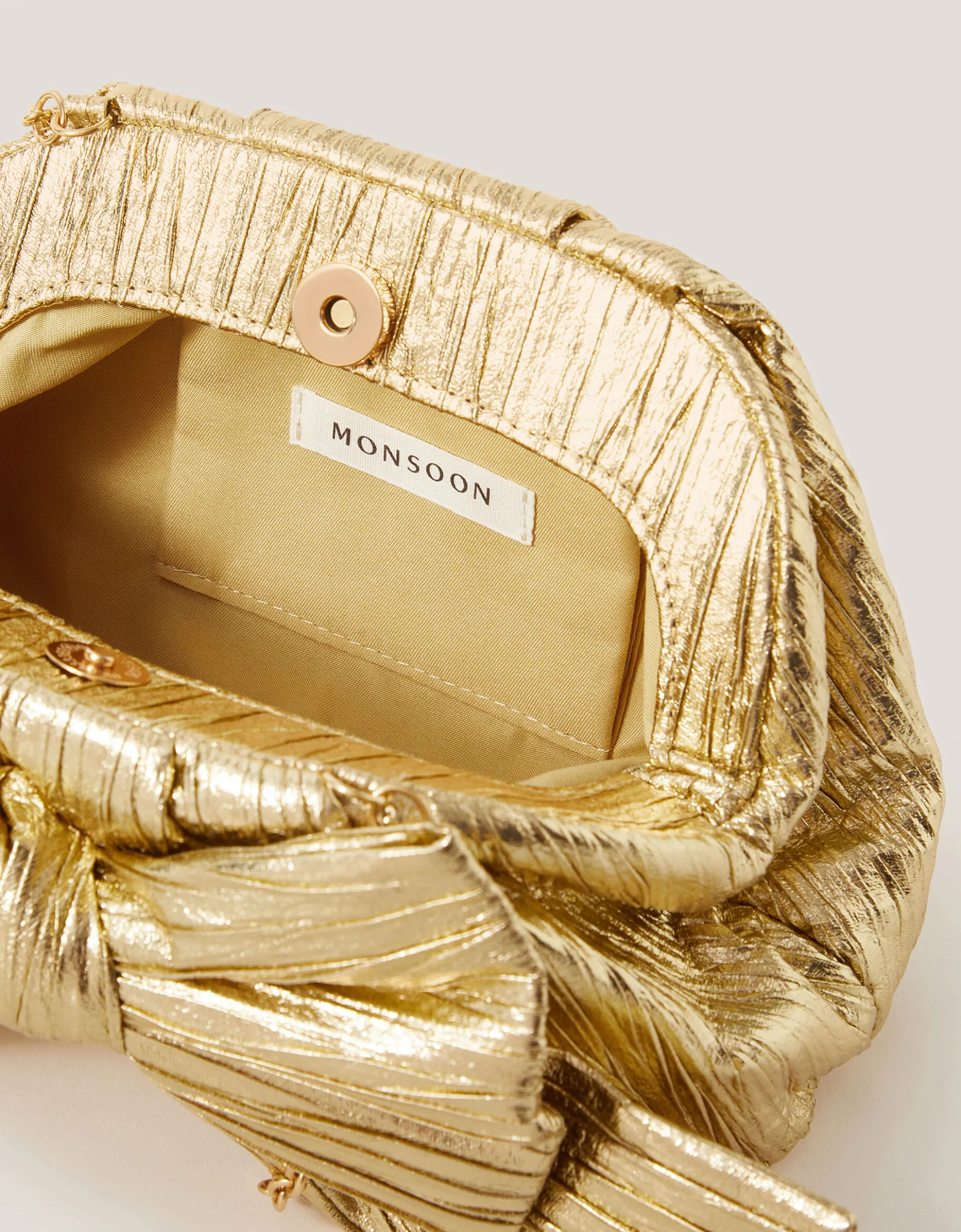 Oversized Bow Metallic Bag